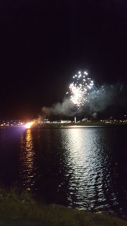 fireworks reflected in the Peddie sea Kirkwall Orkney bonfire night